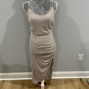 Asymmetrical slit, striped dress